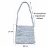 Bolsa tejida artesanal azul con forro satinado